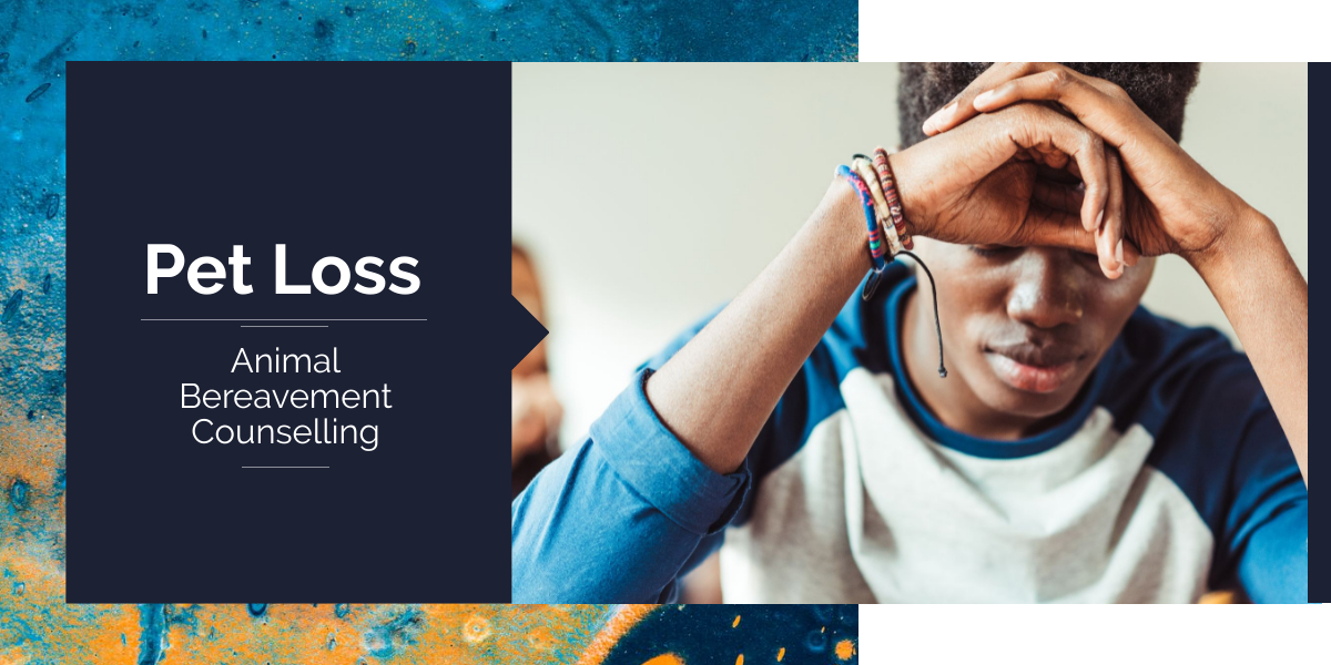A young person with dark skin and short, curly hair sits with their head resting in their hands, looking down with a sad expression. They are wearing a blue and white long-sleeved shirt and several colourful beaded bracelets. The background is blurred. To the left, there is a dark blue panel with white text that reads: "Pet Loss - Animal Bereavement Counselling." The background of the panel features a textured blue and orange pattern.